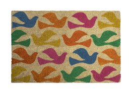 Colorful coir doormat with abstract bird or dove shapes in various vibrant hues including green, blue, orange, and pink.