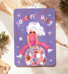 Colorful birthday card with a woman wearing sunglasses and a flower headband, surrounded by tropical leaves and party decorations.