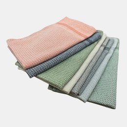 A set of 3 tea towels in various colors including light grey, olive, sand, blue, basil, grey, taupe, peach, and color combinations. The towels feature a textured, waffle-weave pattern.