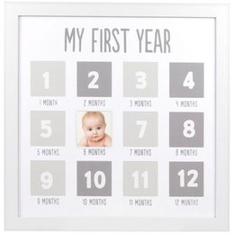  The image shows a "My First Year" wall frame with 12 photo slots, each labeled with the corresponding month. The frame appears to be made of white wood or a similar material, with a simple, minimalist design. The frame is suitable for displaying photos of a baby's first year.