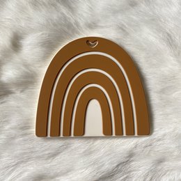  Colorful rainbow-shaped teether with textured surface for baby's gums. Made of safe, non-toxic materials.