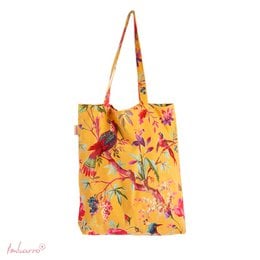 A yellow cross-body bag with a vibrant floral and bird print pattern. The bag has a rectangular shape and appears to be made of a lightweight, durable material.