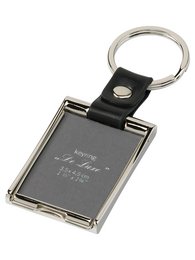 Black rectangular key fob with silver metal frame. Durable leather material.