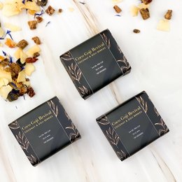 Dark chocolate tea bars with goji berries and a rich, earthy flavor.