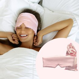  Soft, pink silk sleep mask with adjustable strap for comfortable, distraction-free sleep.