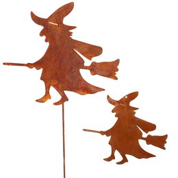 Rusty metal Halloween decoration featuring a witch figure on a rod and one to hang. The witch has a distinctive silhouette and is made of weathered, rusty metal, giving it a vintage, spooky aesthetic. The product is suitable for outdoor garden or patio decor.