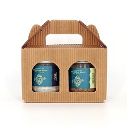 Two glass jars containing seasoning in a cardboard gift box. The jars have blue and white labels with the text "Zeeuwsche Zoute".
