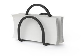  White napkin holder with black metal arched handle, modern minimalist design, rectangular shape, countertop storage.