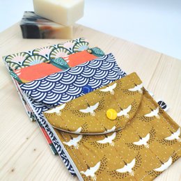 Waterproof soap case with a patterned fabric design featuring colorful waves and butterflies.