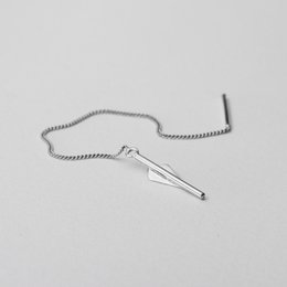 Sleek and modern statement earrings in 14k gold, sterling silver, or a 14k gold-sterling silver combo. The arrow-shaped design creates a bold, minimalist look.