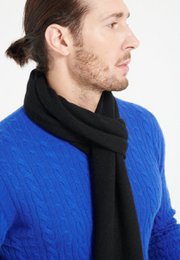  Soft, warm black cashmere scarf with a classic design to complement any outfit.