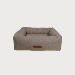  Rectangular dog bed with raised sides, dusty grey fabric, soft cushioned design for pets.