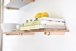 White 50cm wall shelf with wooden accents, suitable for displaying decorative items.
