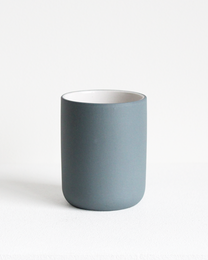 Teal ceramic coffee mug, 150 ml capacity.