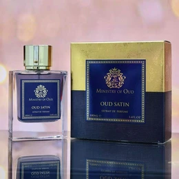 Oud Satin perfume by Ministry of Oud, a luxurious fragrance with a rich, woody aroma. The perfume is presented in a sleek, navy blue bottle with gold accents, reflecting its sophisticated and elegant design.