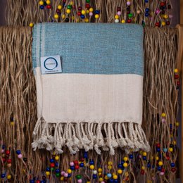 Soft, absorbent beach towels in neutral tones, perfect for the beach, shower, or sauna.