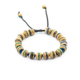 Colorful recycled skateboard bead bracelet with 10mm beads in a variety of blue, tan, and black tones.
