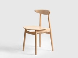Wooden dining chair with simple, minimalist design. Features a curved backrest and a square seat.