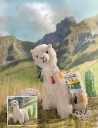 Cuddly white plush llama toy, 23cm tall, with colorful patterned blanket, suitable for stuffing and customization, in a scenic mountain landscape.