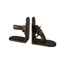 Antique brass shiny bookend in the shape of a gun, with a classic and decorative design.