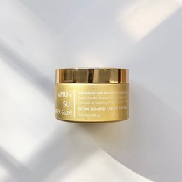 Mineral-rich body polish with a golden, creamy texture. Infused with nourishing ingredients to exfoliate and hydrate skin.