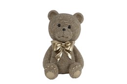  Large teddy bear sculpture, beige textured material, sitting position, gold ribbon bow, decorative statue.