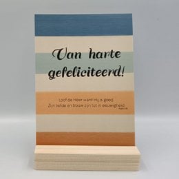 A greeting card with the Dutch text "Van harte gefeliciteerd!" which translates to "Congratulations!" The card has a simple, elegant design with a blue and orange color scheme.