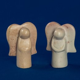 Small soapstone angel figurine with simple, minimalist design.