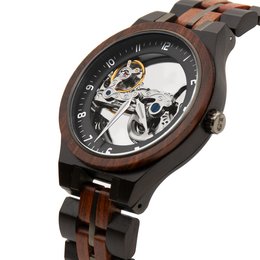 Wooden watch with skeleton dial and brown and orange tones. Features a unique open-heart design showcasing the inner mechanical workings.