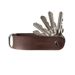Leather key organizer in various colors including cognac brown, pure brown, and classic black. Compact and convenient for organizing keys.