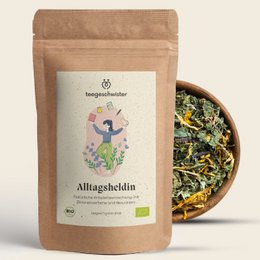 Organic herbal tea blend with natural ingredients, including chamomile, lemon balm, and marigold flowers. Suitable for everyday consumption.
