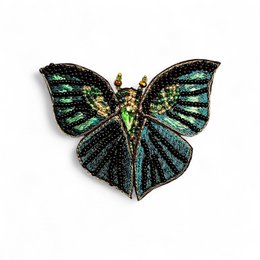  Black butterfly brooch with iridescent green and blue wings, beaded embellished design, statement jewelry piece.