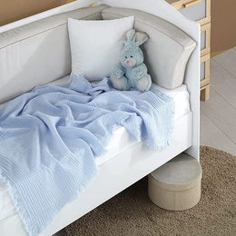 A soft, light blue muslin baby burp cloth made of 100% cotton. The cloth features a textured, woven pattern and frayed edges for a cozy, vintage-inspired look. Ideal for soothing and cleaning up messes during feeding time.