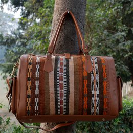 Skórzana, pastelowo-brązowa torba Kilim