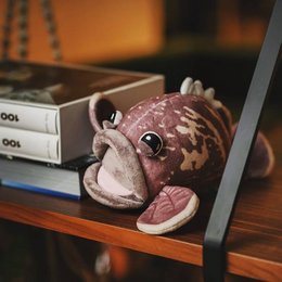 Plush grouper fish toy with spotted pattern, large eyes, and soft, cuddly texture.
