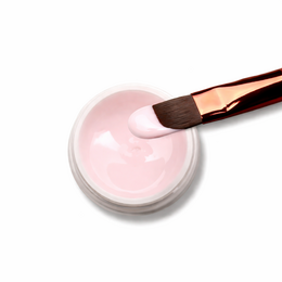 Peach-colored gel nail polish in a small jar with a gold lid. The product is described as a "Colourgel no wipe" from the Doriana Cosmetics brand.