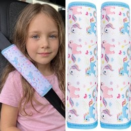 Colorful unicorn-patterned car seat belt protectors for kids, featuring a soft, padded design to provide comfort and safety during travel.