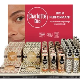 This product is a multi-product display stand featuring various Charlotte Bio makeup products. The display includes a variety of makeup items such as lipsticks, foundations, and other face makeup products. The products are presented in an organized and visually appealing manner, showcasing the brand's range of bio and performant cosmetics.