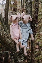 Soft, plush mouse-themed plushies in pink and gray colors, with round shapes and cute expressions, suitable for children's play and decoration.