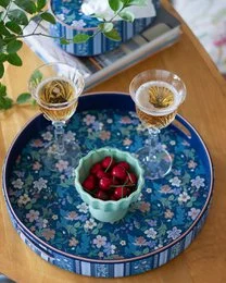 Round vegan leather tray, midnight blue floral pattern, botanical meadow design, serving piece