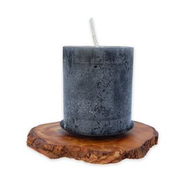 Rustic olive wood candle holder with a dark gray candle. The candle holder has a natural, organic appearance with the wood grain visible.