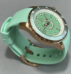 Mint green watch with rose gold accents, featuring a 3-hand analog display and 10 ATM water resistance.