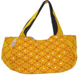 Handmade antique-style yellow tote bag with diamond-shaped pattern and silver studs. Made of durable fabric, suitable for everyday use as a shoulder bag.