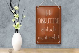 Tin sign saying 12x18cm I no longer discuss decoration