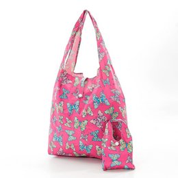 A pink reusable shopping bag with a butterfly print made from recycled nylon material.