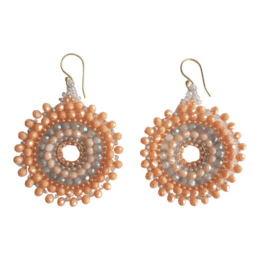  Elegant statement earrings featuring a round design with mother of pearl accents. The earrings have a unique and eye-catching appearance, perfect for adding a touch of sophistication to any outfit.
