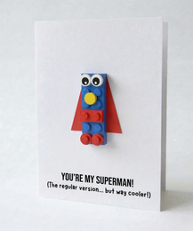  Lego Superman postcard, blue red yellow character, superhero toy brick figure, greeting card