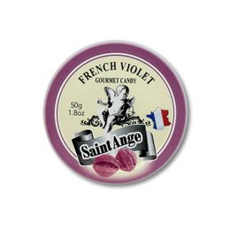 Violet-flavored bonbons in a round tin container with the brand name "Saint-Ange" prominently displayed.