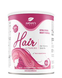 Hair vitamins in a pink and white container. Supports healthy hair growth and strength.