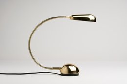 Brass table-wall lamp with a gloss finish and 3000K color temperature.